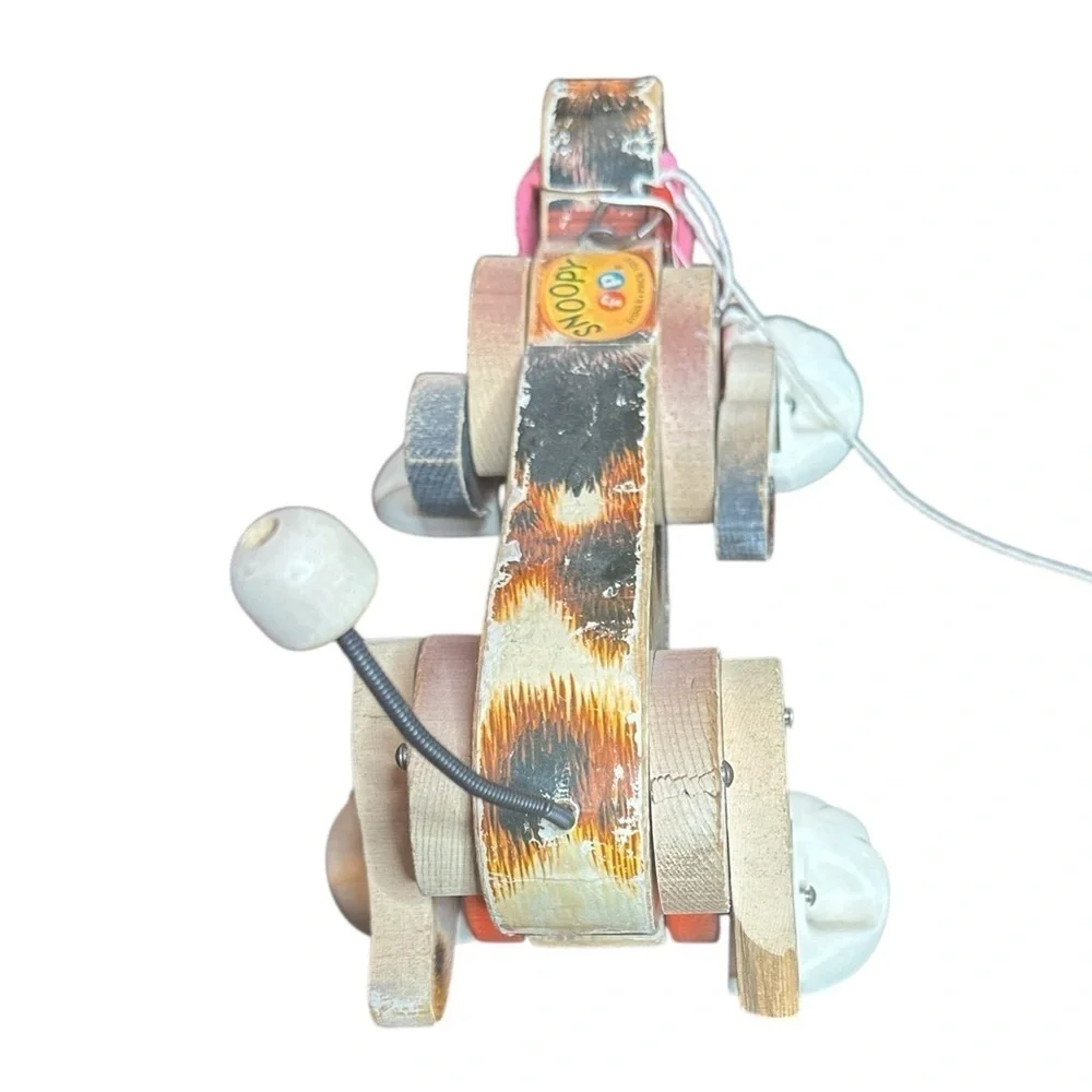 Fisher-Price Snoopy Dog Pull Toy with Red and Black Accents